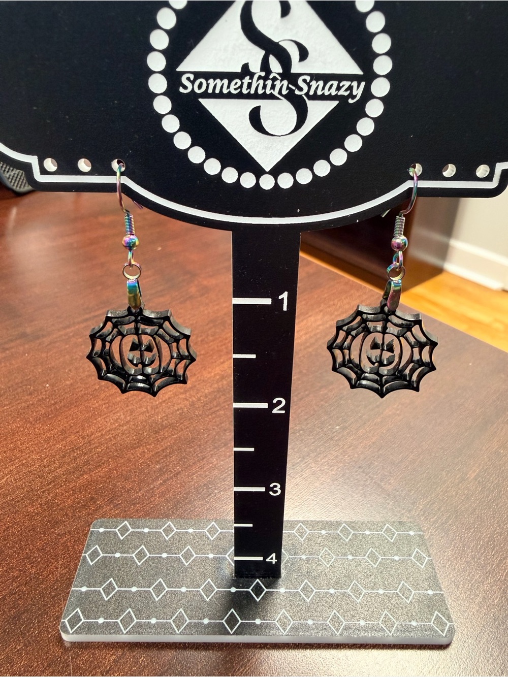 Hand crafted by me Pumpkin in a Spider 🕷️ web earrings-hypoallergenic